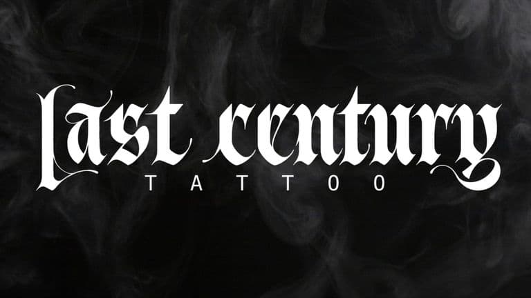 “Last Century Tattoo logo in gothic font with smoky black background.”