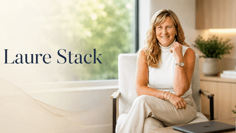 Laure Stack smiling in a bright office, seated in a chair beside her name.