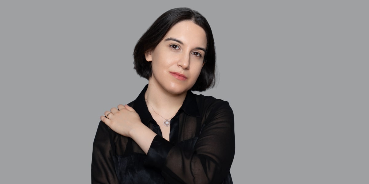 Portrait of Luna Vintner, a multidisciplinary artist, blending acting, music, and advocacy for accessibility in the arts.
