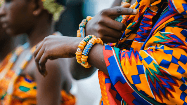 Vibrant traditional attire with colorful patterns and jewelry worn during a cultural celebration