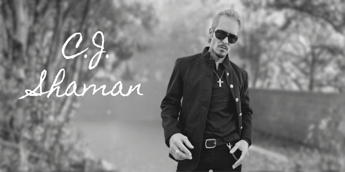 C.J. Shaman, a rebellious rock artist with a bold, raw style, exudes confidence and defiance, embodying rock's spirit.