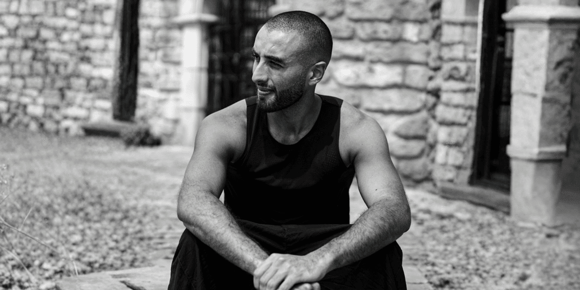 Kaikhan Salakhov, multidisciplinary artist, exploring humanity's future through art, science, and philosophy in the realm of space exploration.